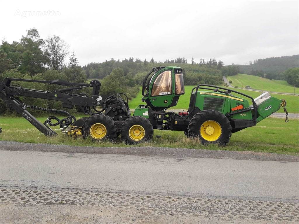 John Deere 1470E + Haas winch other combine